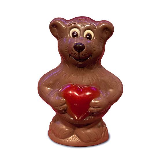 Adorable milk chocolate teddy bear with a red heart 80g